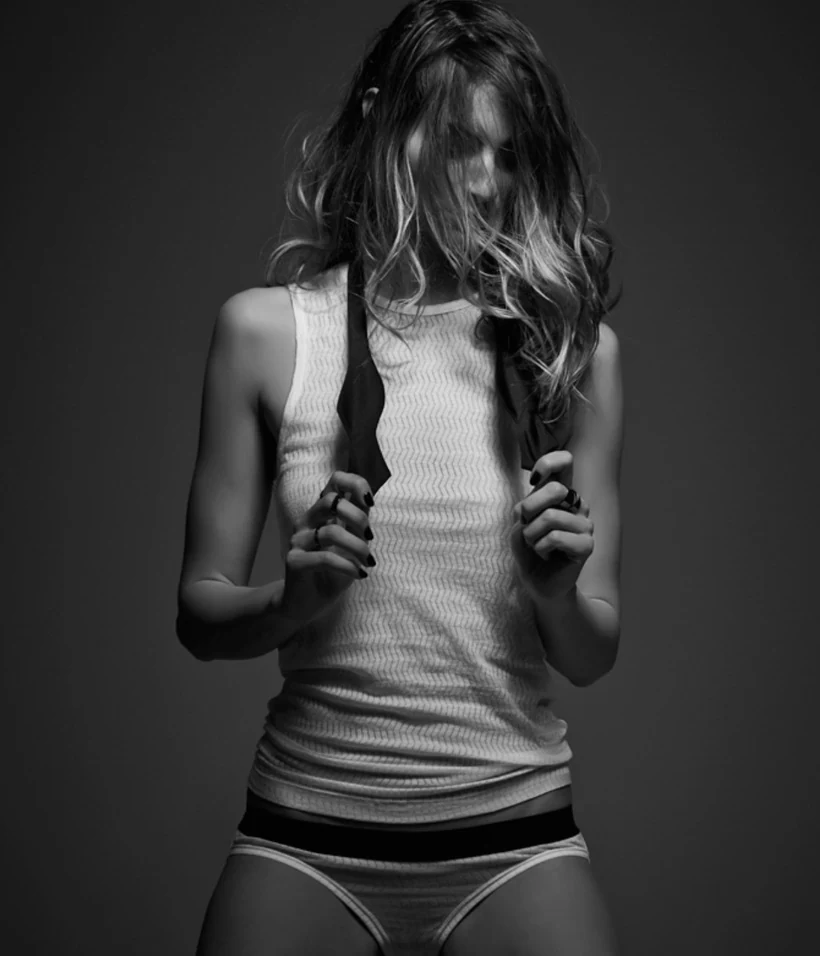 Black and white Sloane & Tate campaign image with tank and briefs